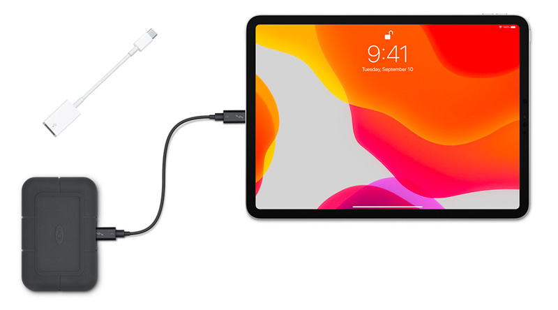 Conecte el iPad a una unidad externa con un adaptador USB